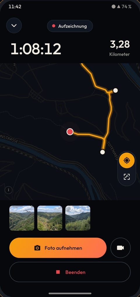 The Maptale app recording by the river Lahn: time and distance, below them the map with the trail so far and the photos as dots