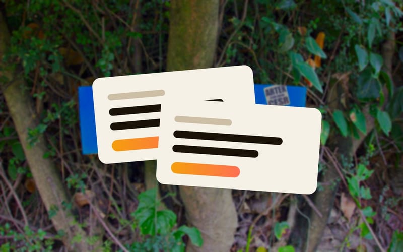 Two offset cards with lines of text in front of a bilingual signpost in China